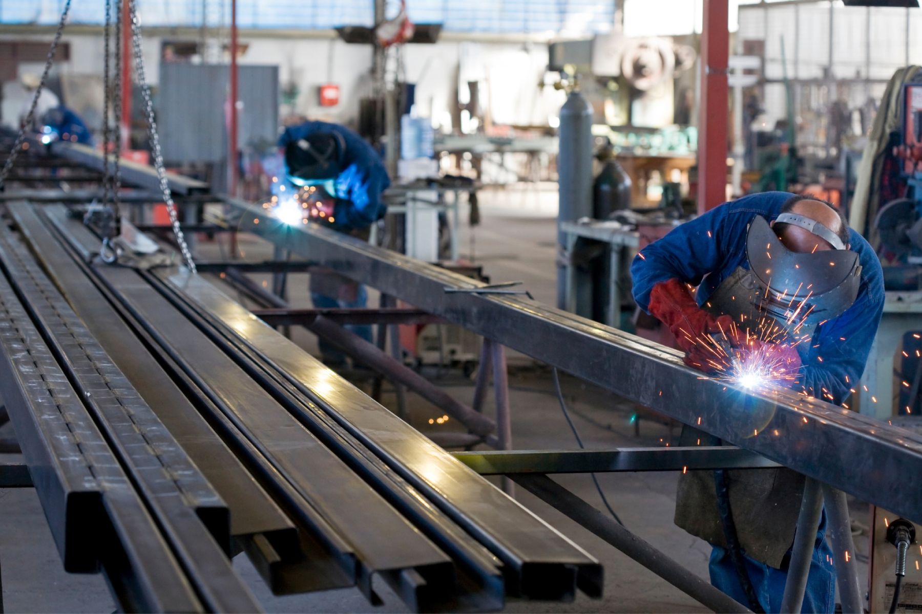 Welder fabricating steel
